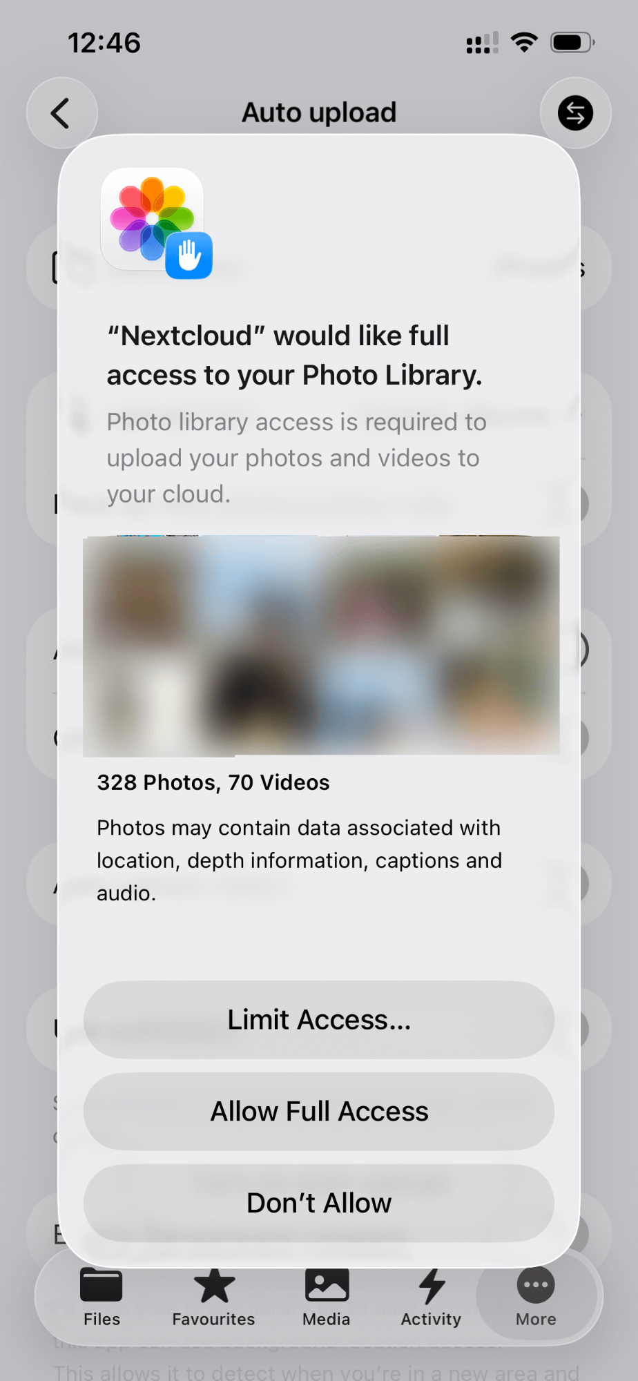 iOS prompt asking photo library access for Nextcloud app